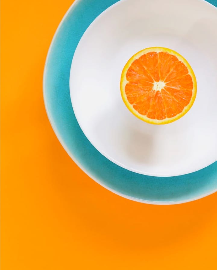 image d'une orange coupée en deux